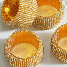 Load image into Gallery viewer, The Blond Beaded Set of Four Napkin Rings
